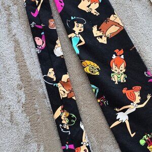 Flinstone theme tie. Have a yaba-doo time. Great conversation piece